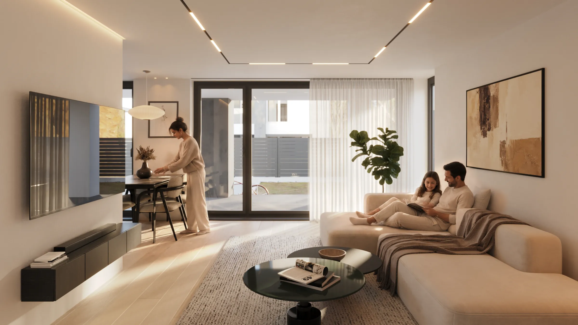 Couple relaxing in the living room of a Compass on the Lake villa